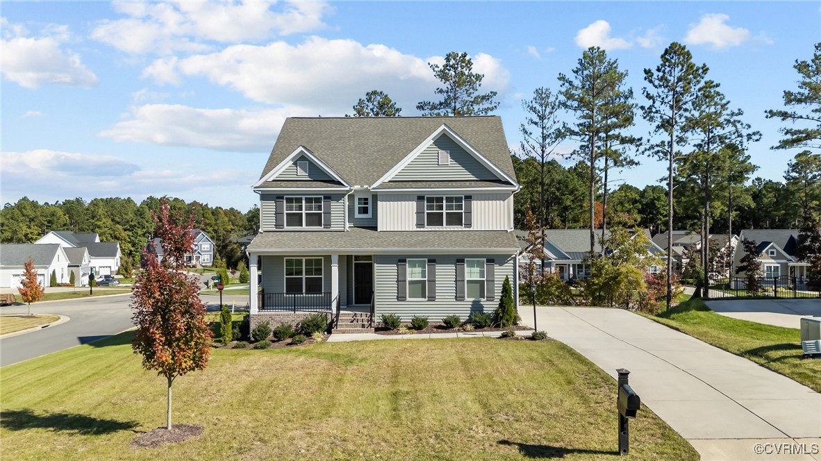 View of front of house featuring a porch and a fro