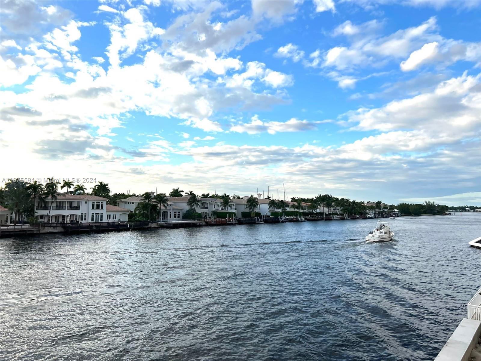 a view of a lake with houses