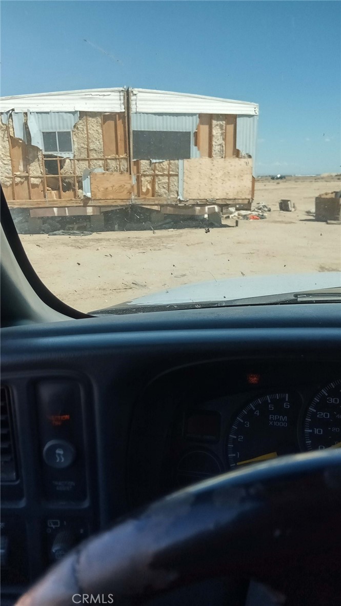 a view of floor to ceiling window and an oven