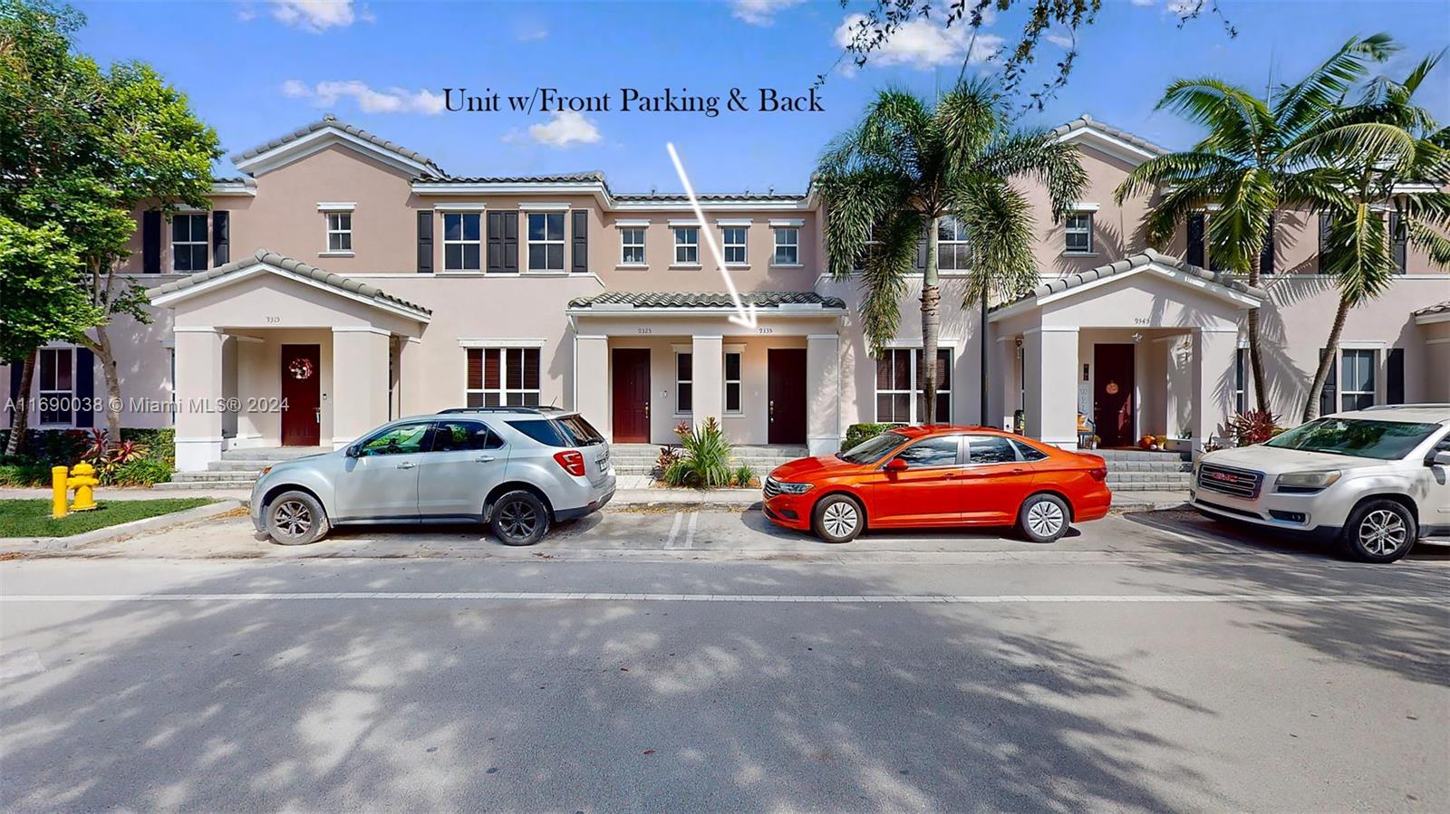 a view of a car parked in front of a house