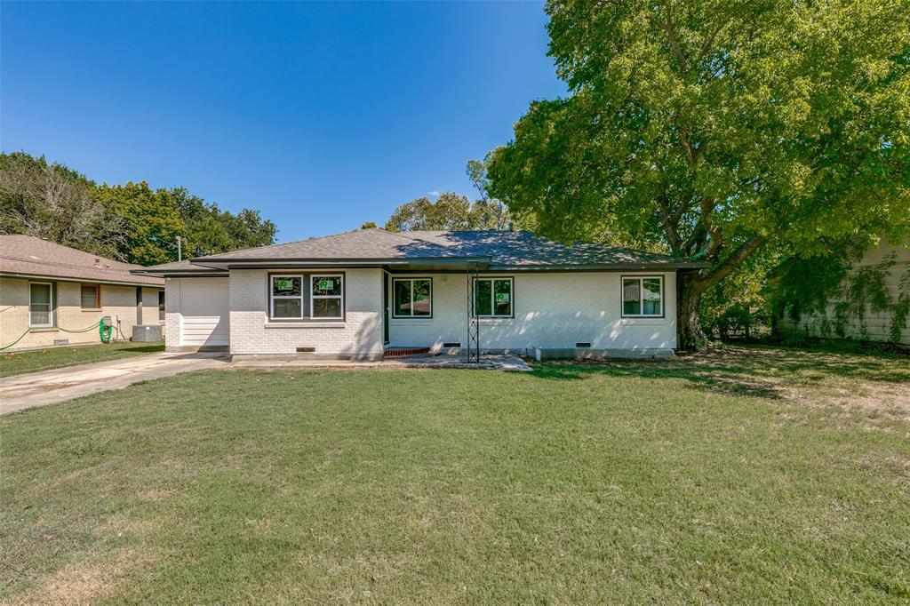 front view of a house with a patio