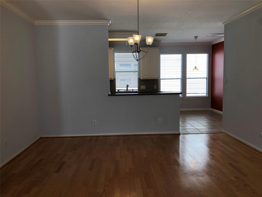 living area looking towards kitchen.