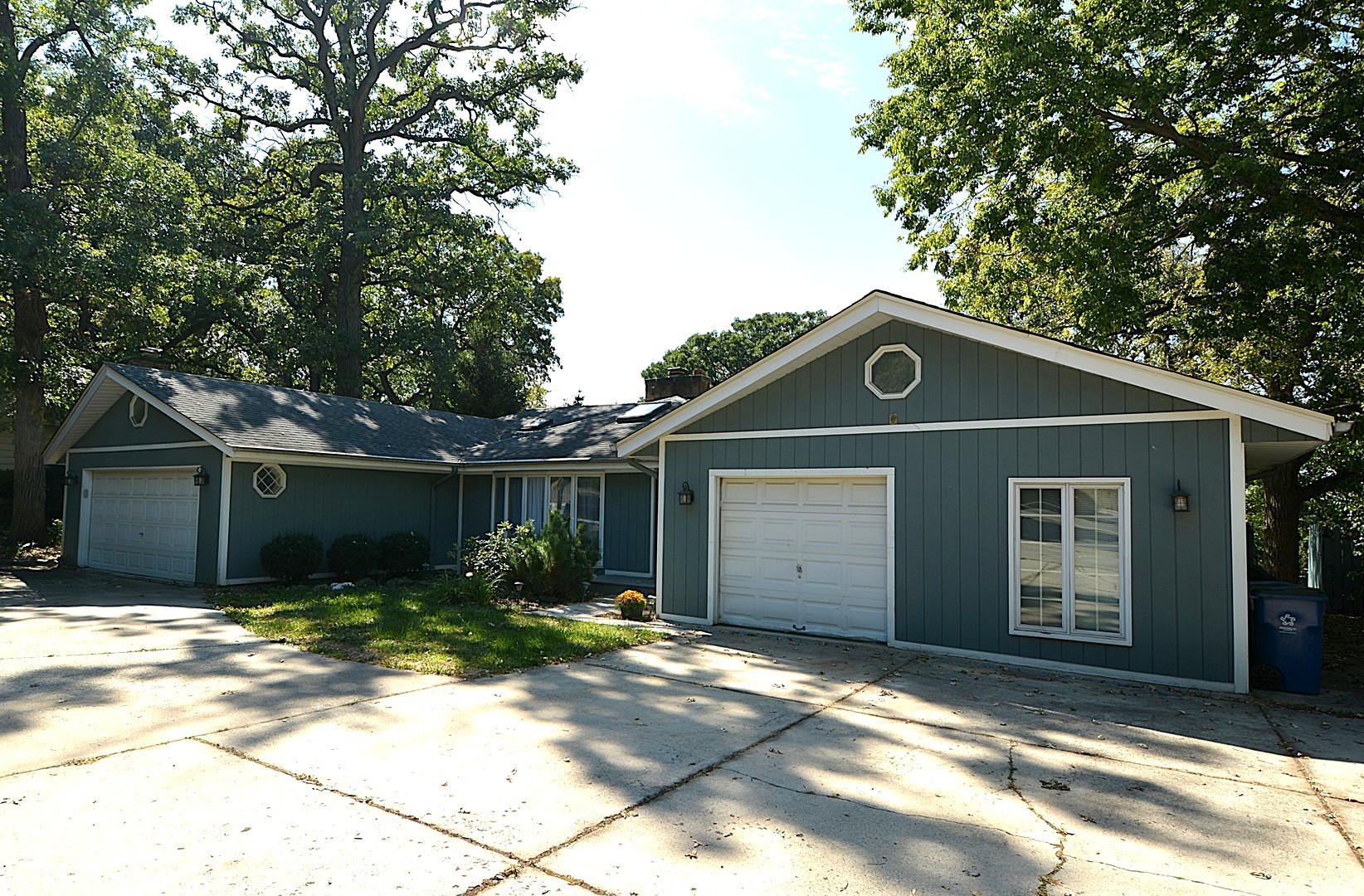 a front view of a house with a garage