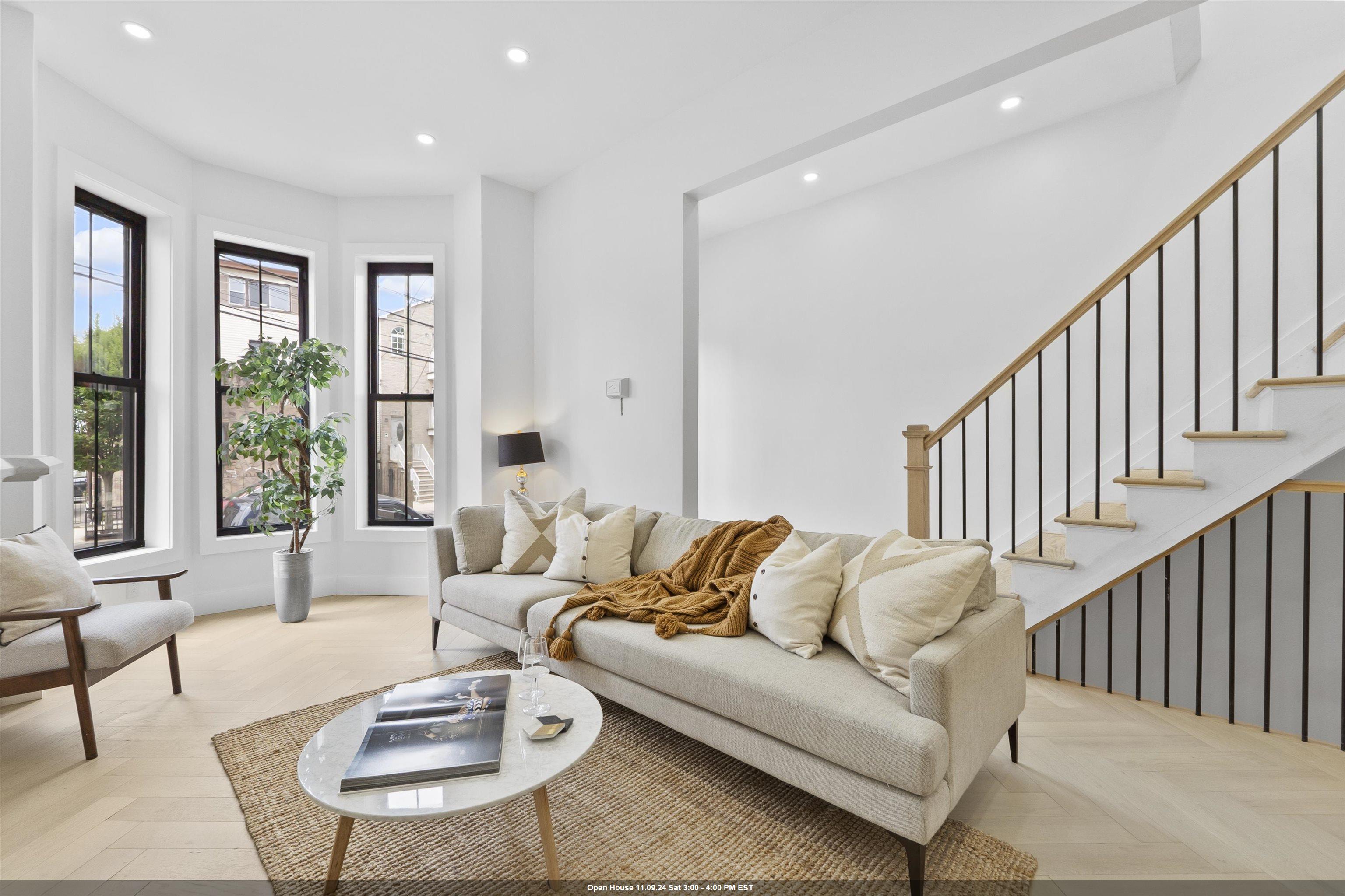 a living room with furniture and a table