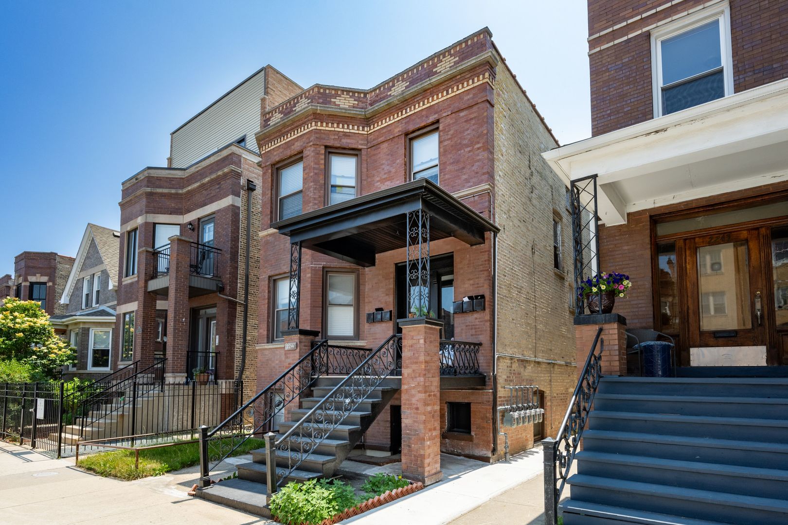 a front view of a building with street view