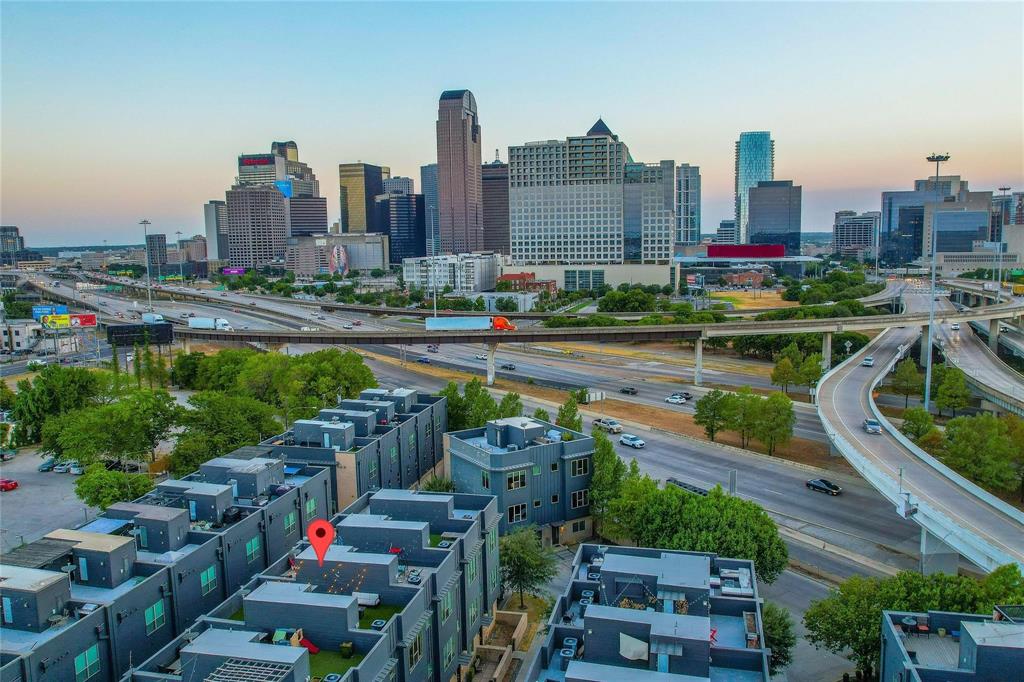 a view of a city with tall buildings