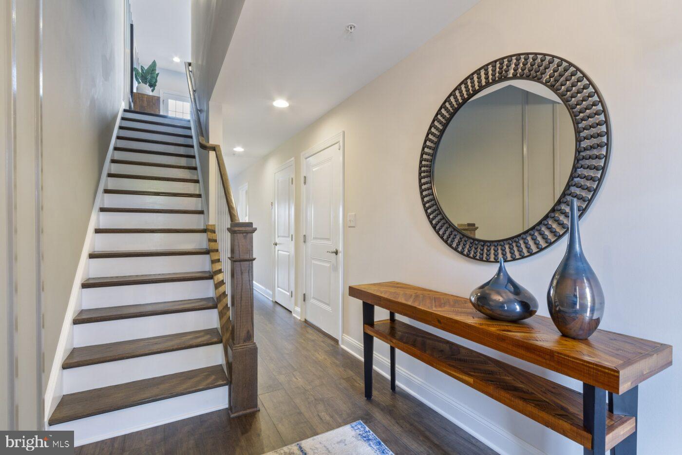 a view of entryway with wooden floor