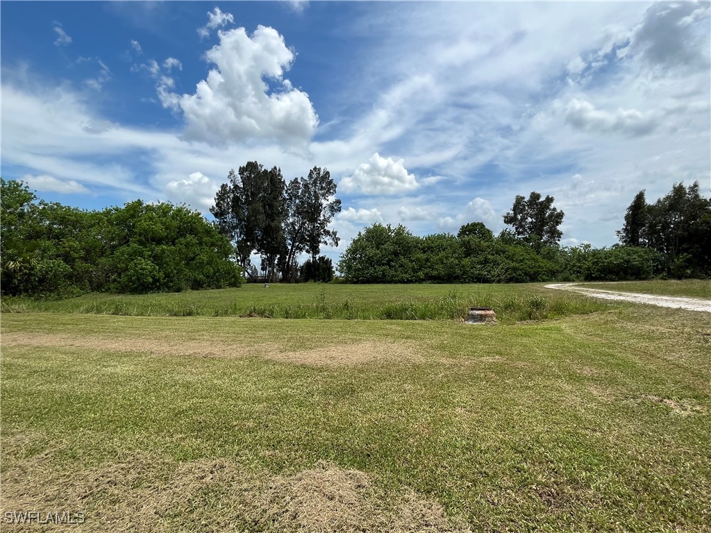 a view of a golf course with a lake