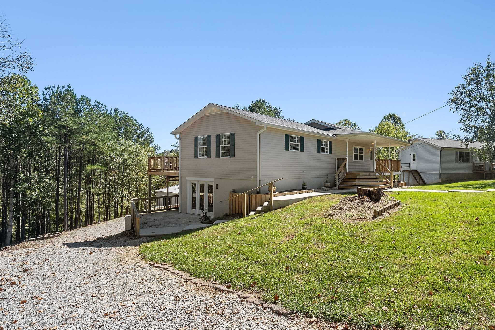 a front view of a house with garden