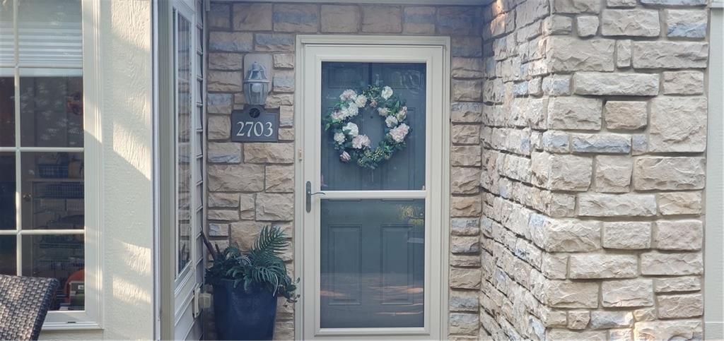 a front view of a house with a door