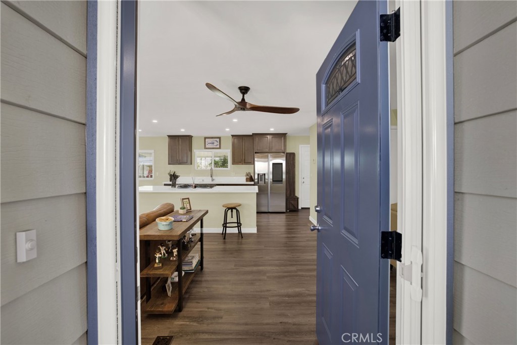 a view of a kitchen from the hallway