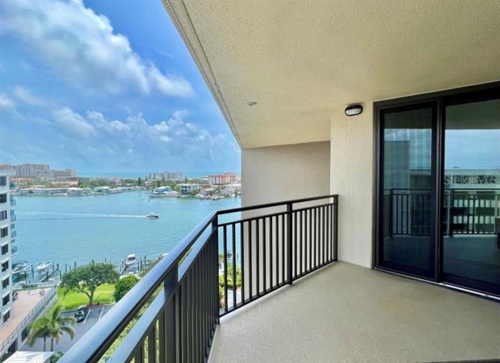 a balcony with an ocean view