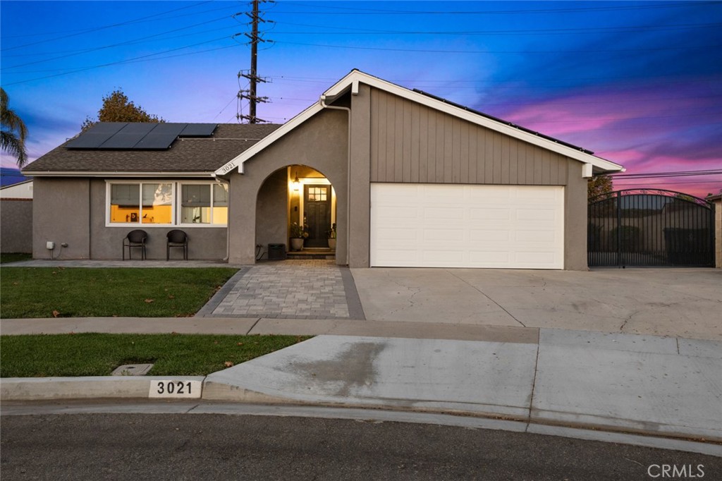 a front view of a house with garage