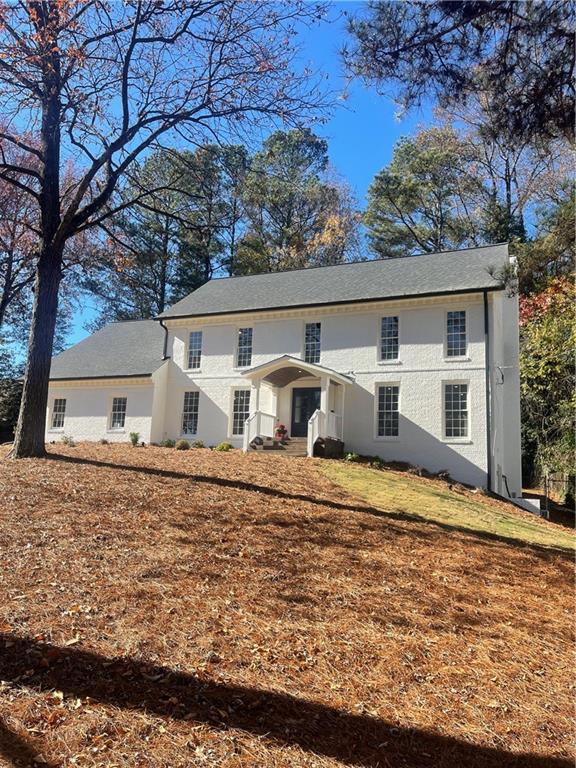 a front view of house with yard