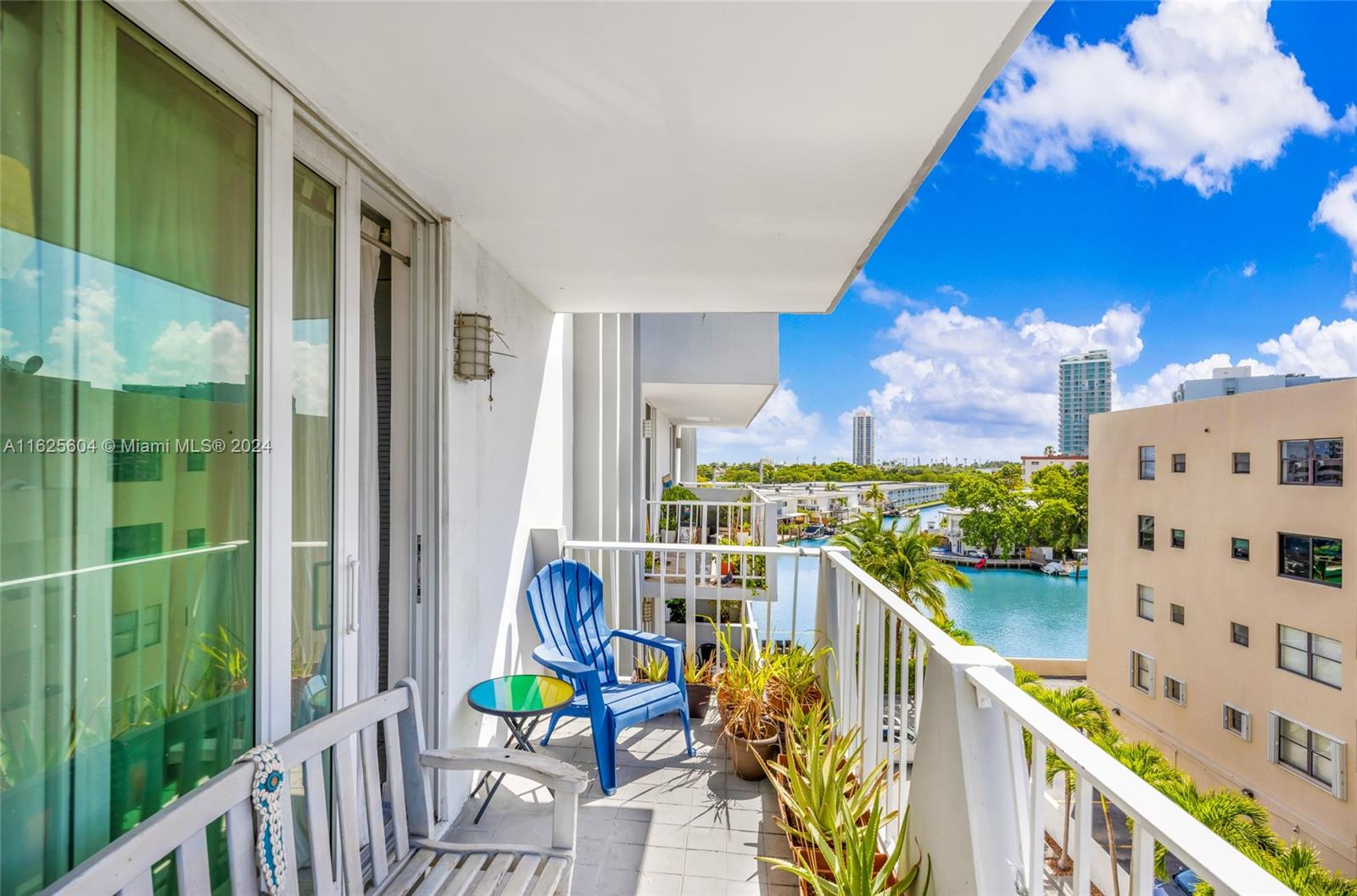 a view of a balcony with chairs