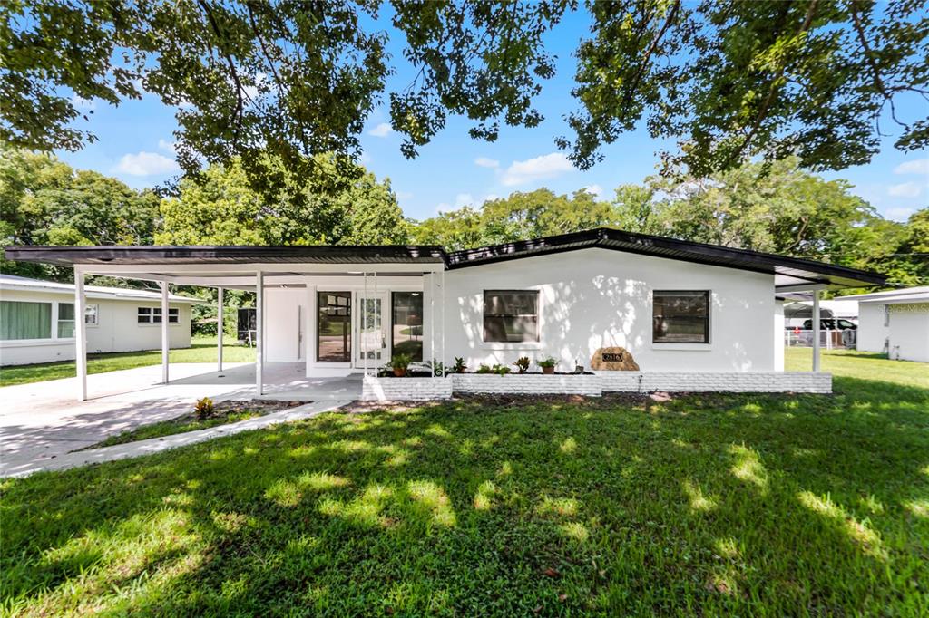 View of front of home with carport