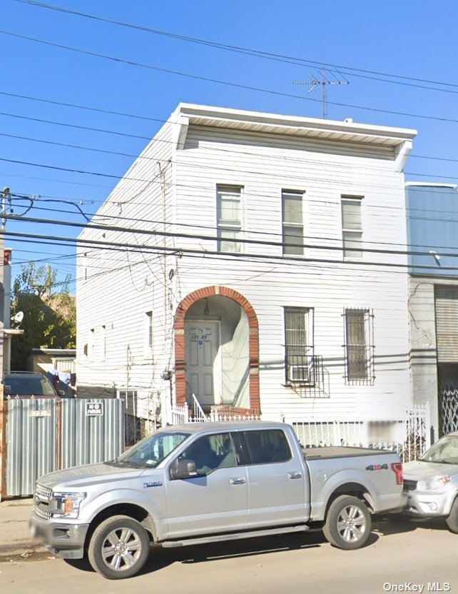 a car parked in front of a house