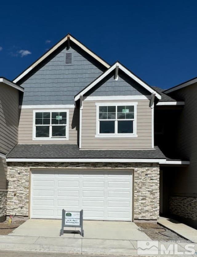 a view of a house with garage