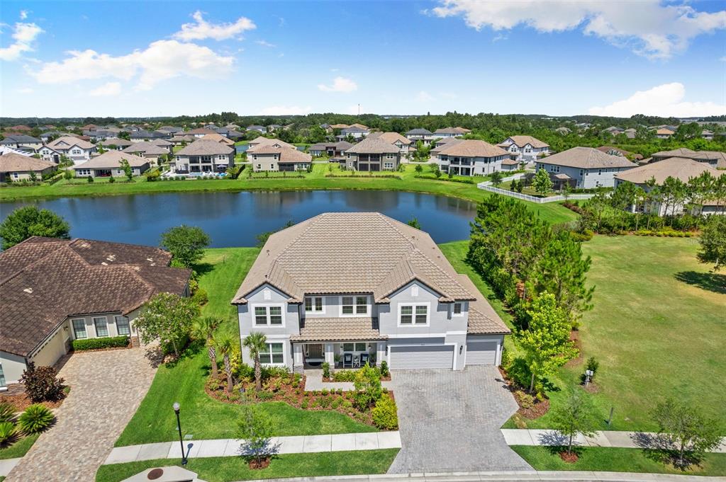 an aerial view of a house with a garden view