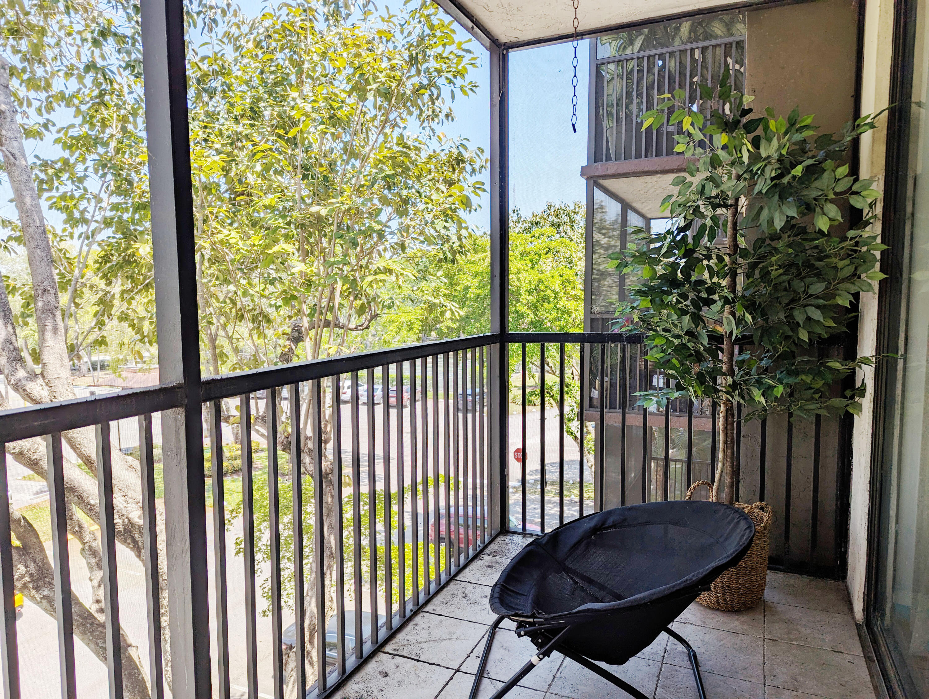 a view of a two chairs in the porch