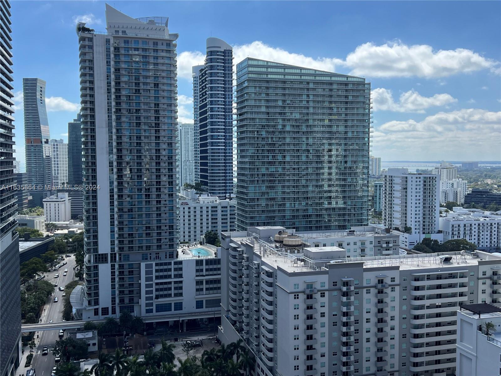 a view of a city with tall buildings