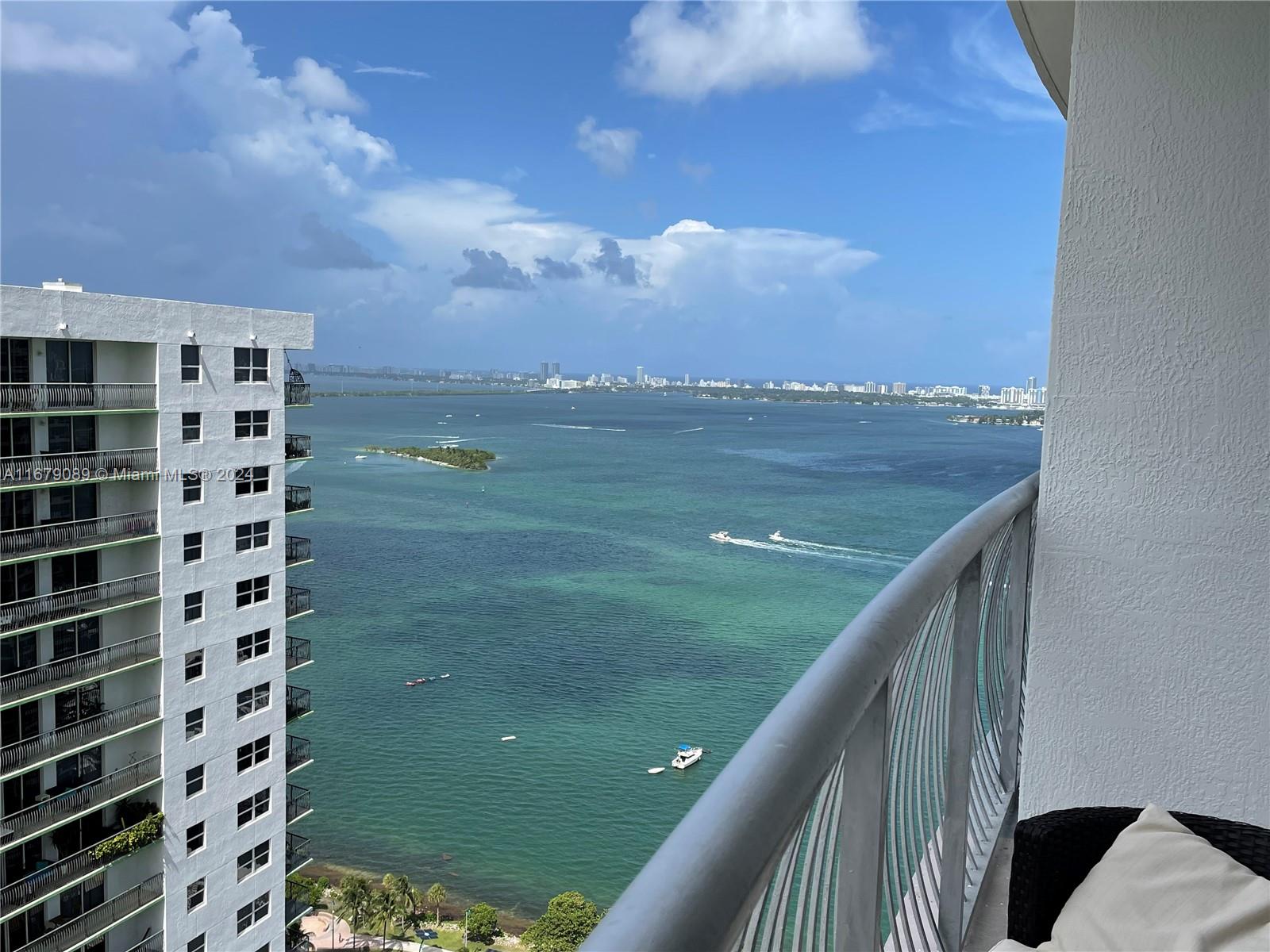 a view of balcony with furniture