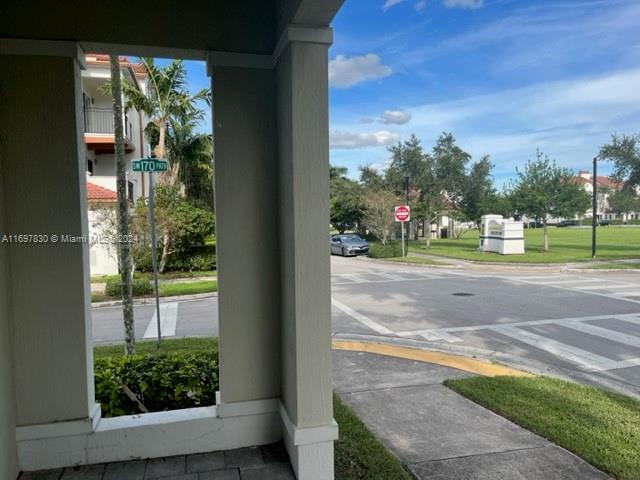 a view of a yard in front of a house