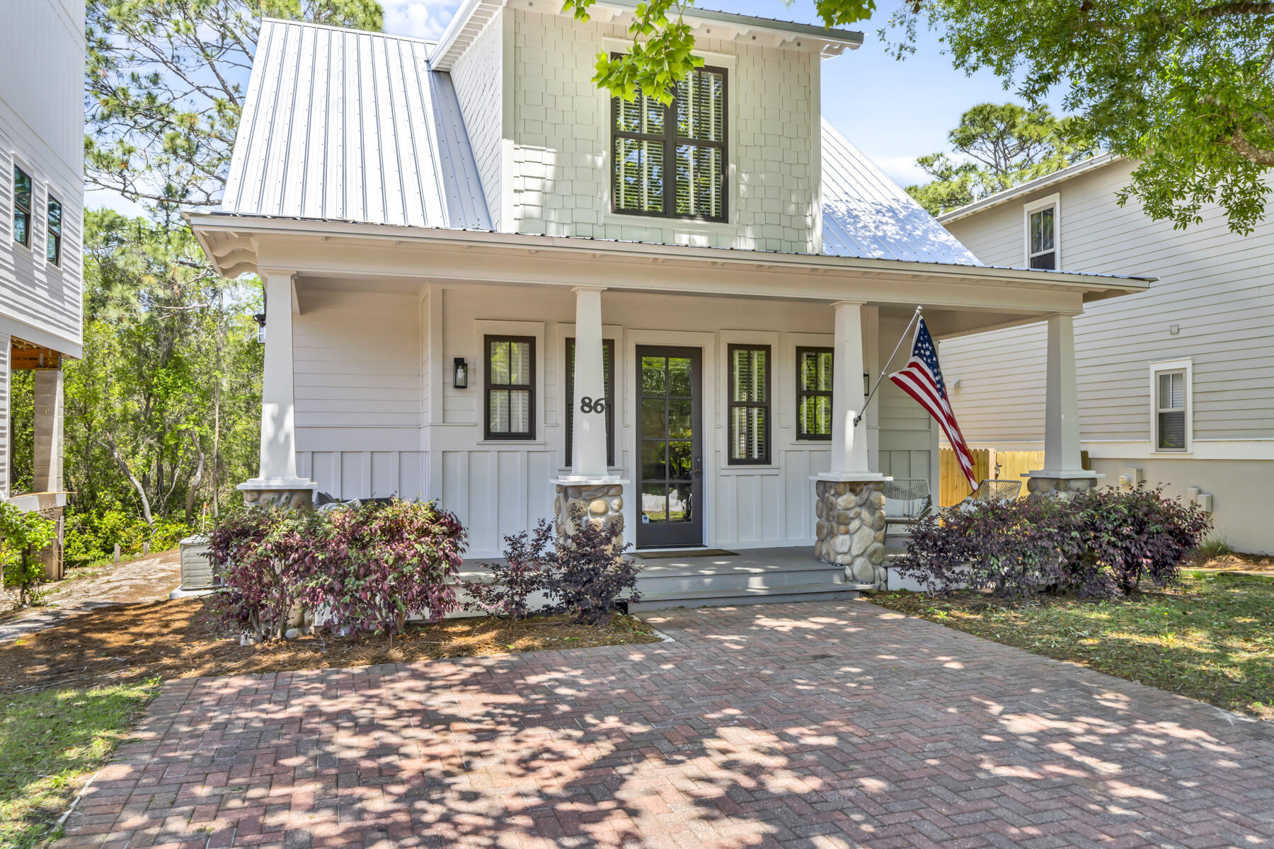 front view of a house with a yard