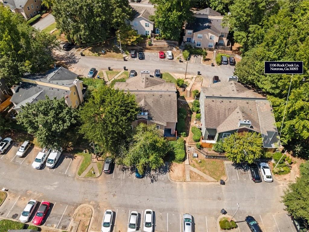 an aerial view of a houses with outdoor space