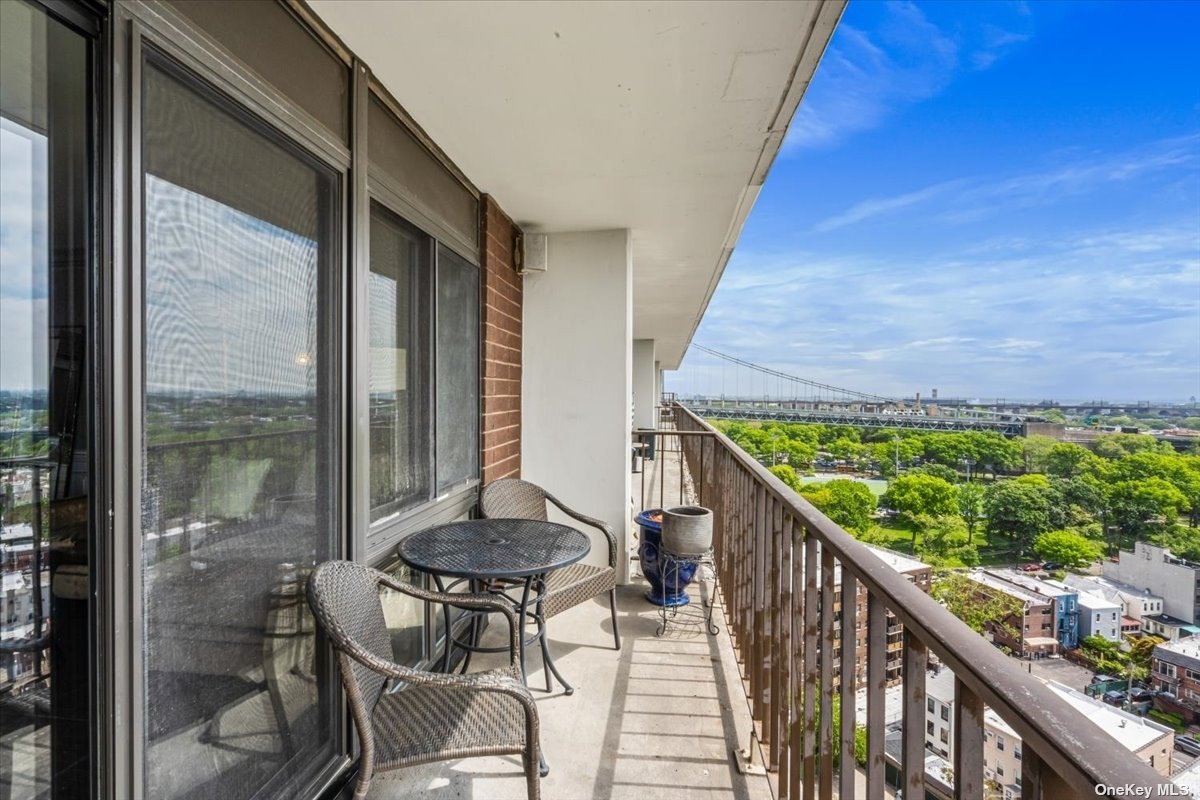 a view of balcony with furniture