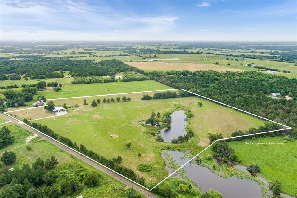 a view of a swimming pool with a lake view