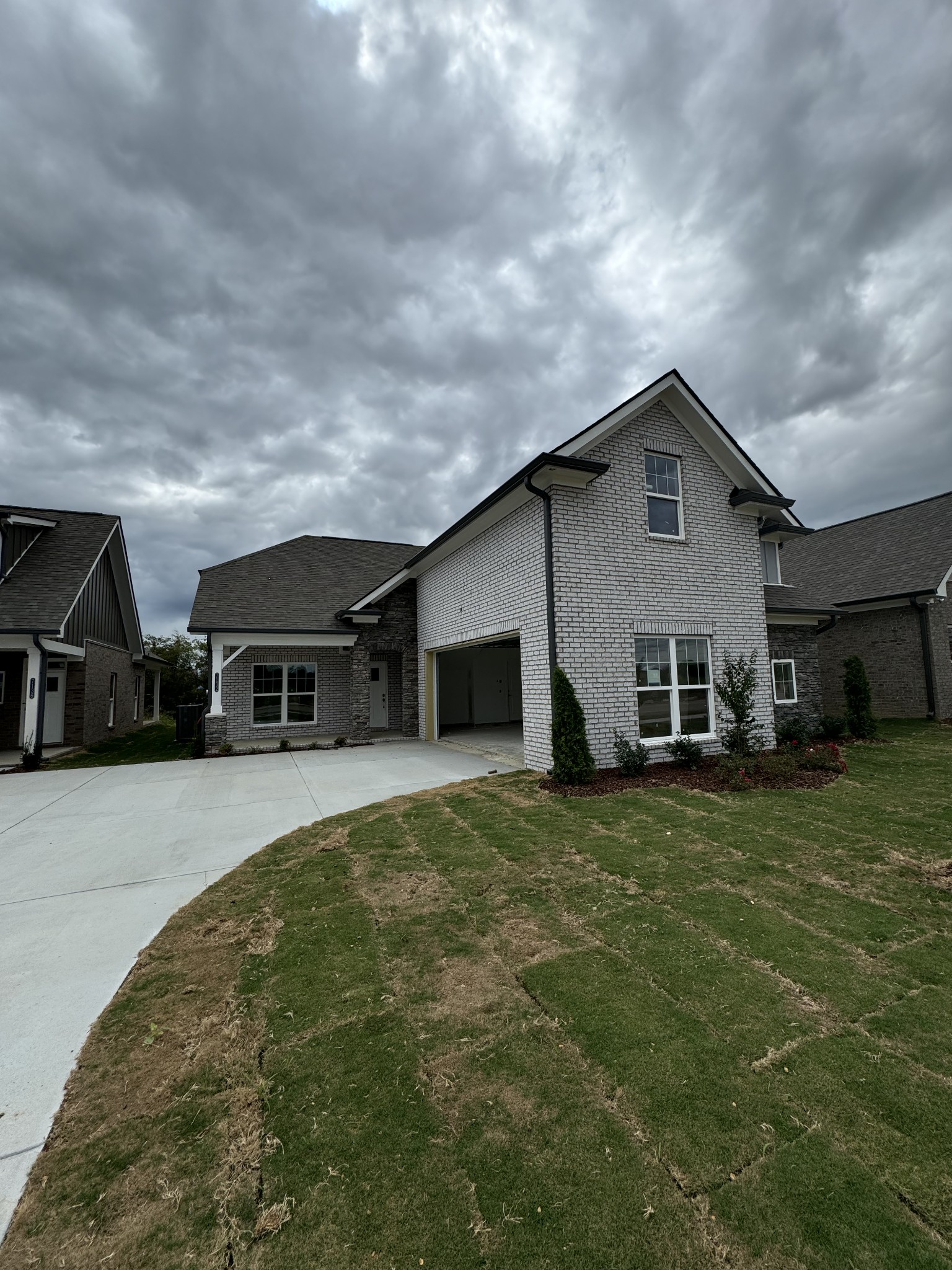 a house view with a garden space