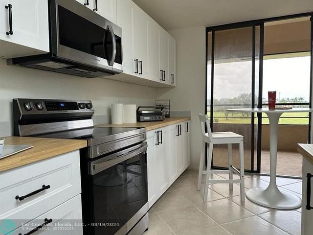 $349,000 | 7460 La Paz Boulevard, Unit 302 | Boca Pointe