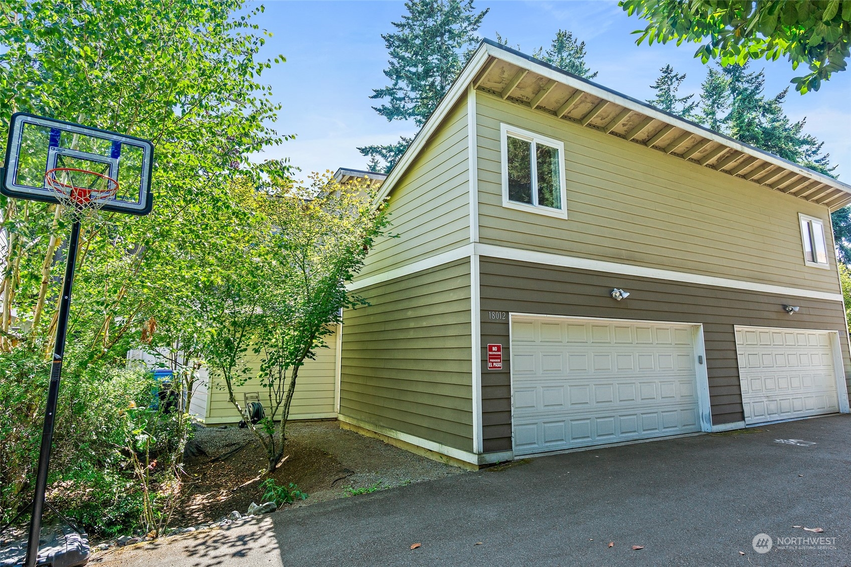 a front view of a house with a garage