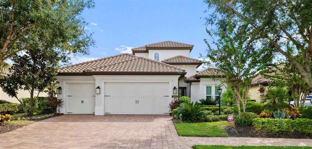 a front view of a house with a garage