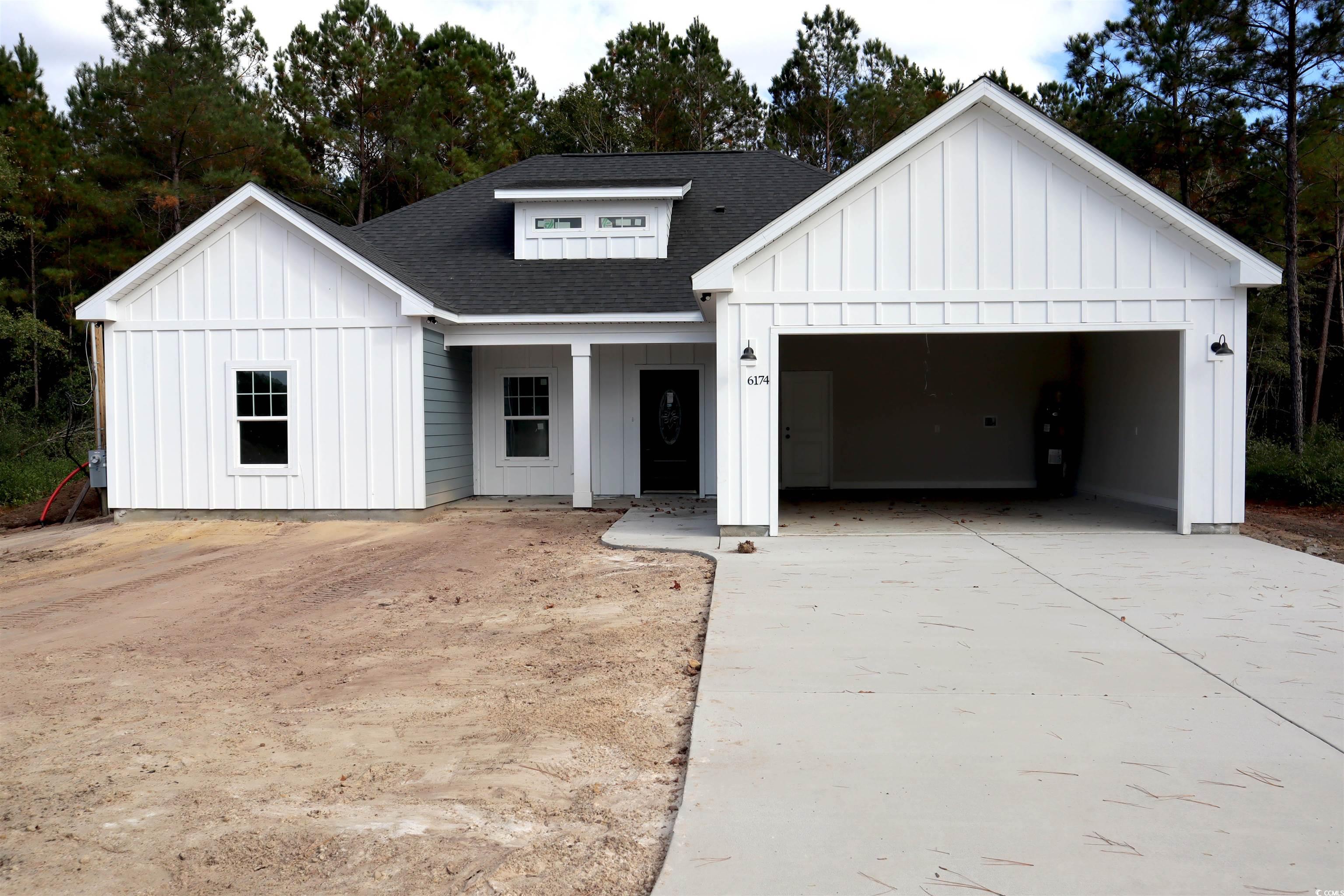 Modern farmhouse with a garage