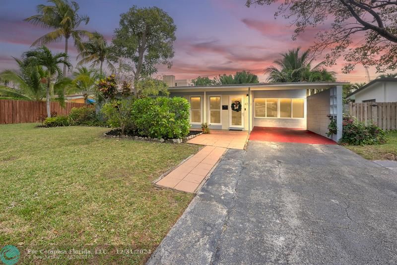 front view of a house with a big yard