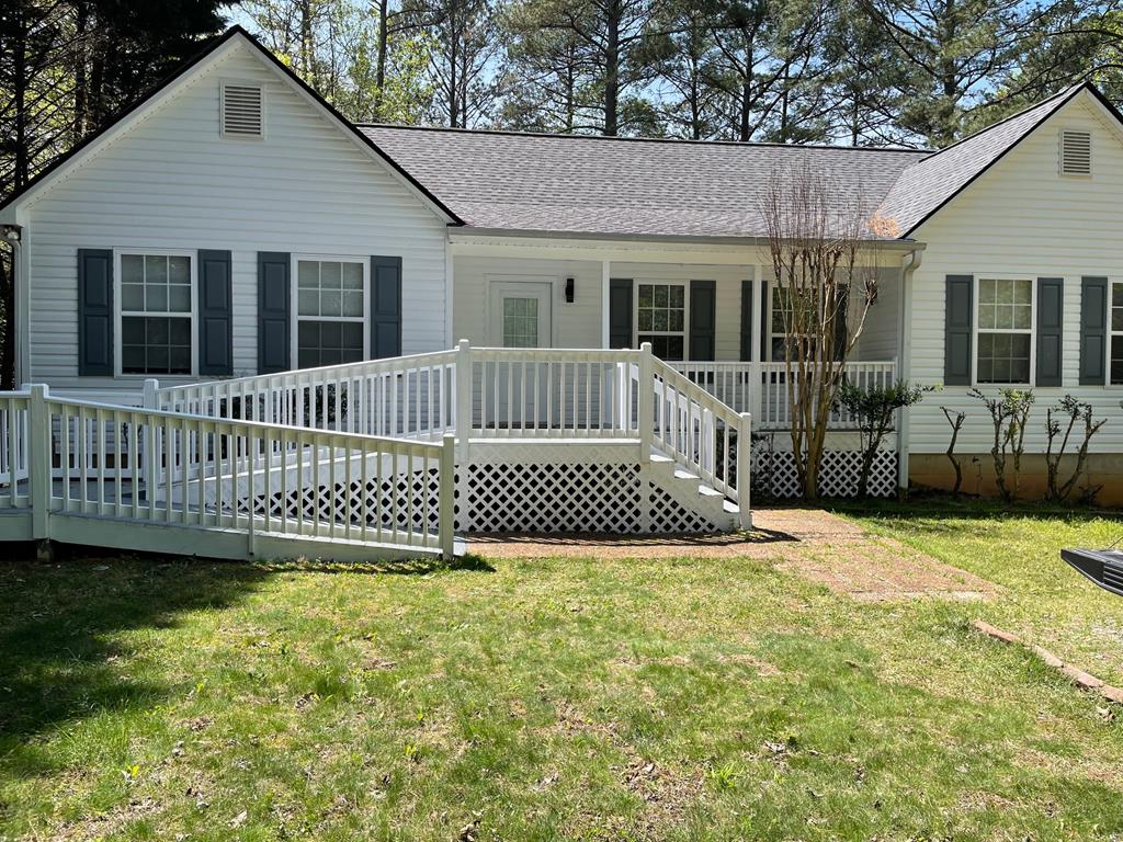 a view of a house with a garden