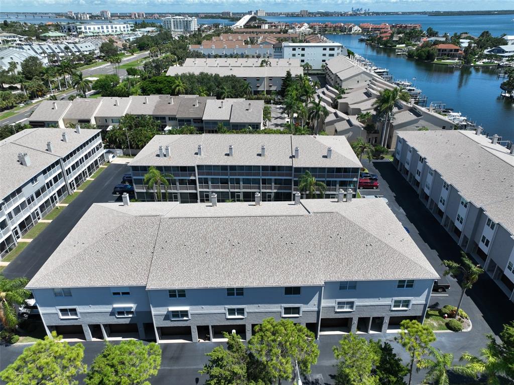 an aerial view of a house with a lake view