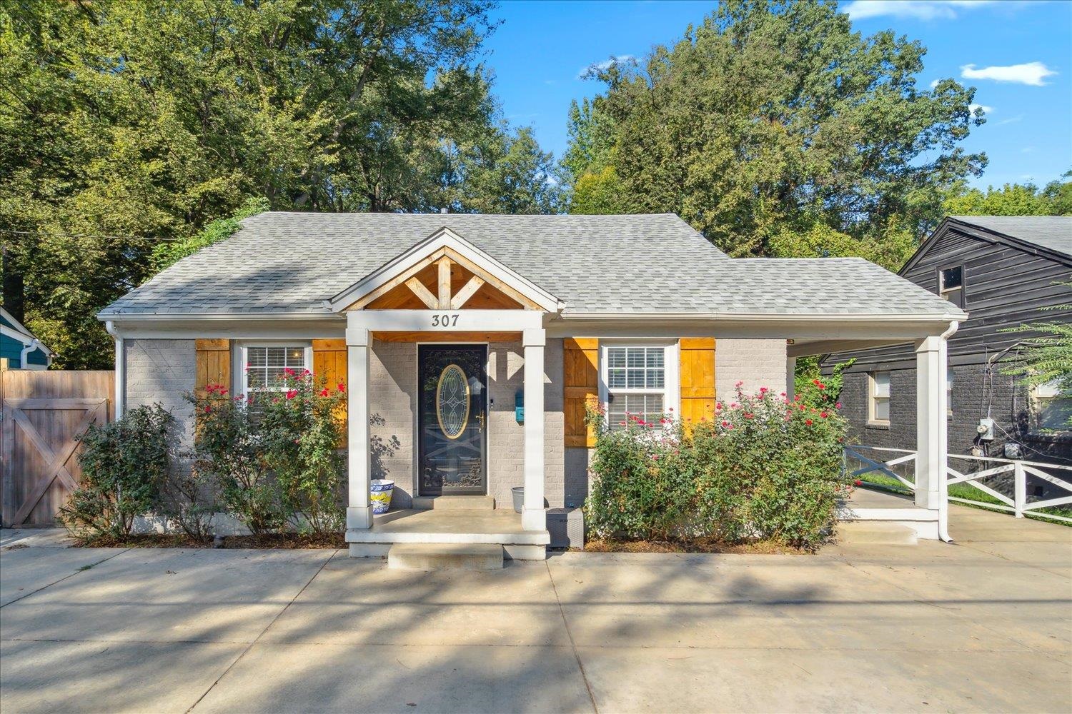 front view of a house with a yard