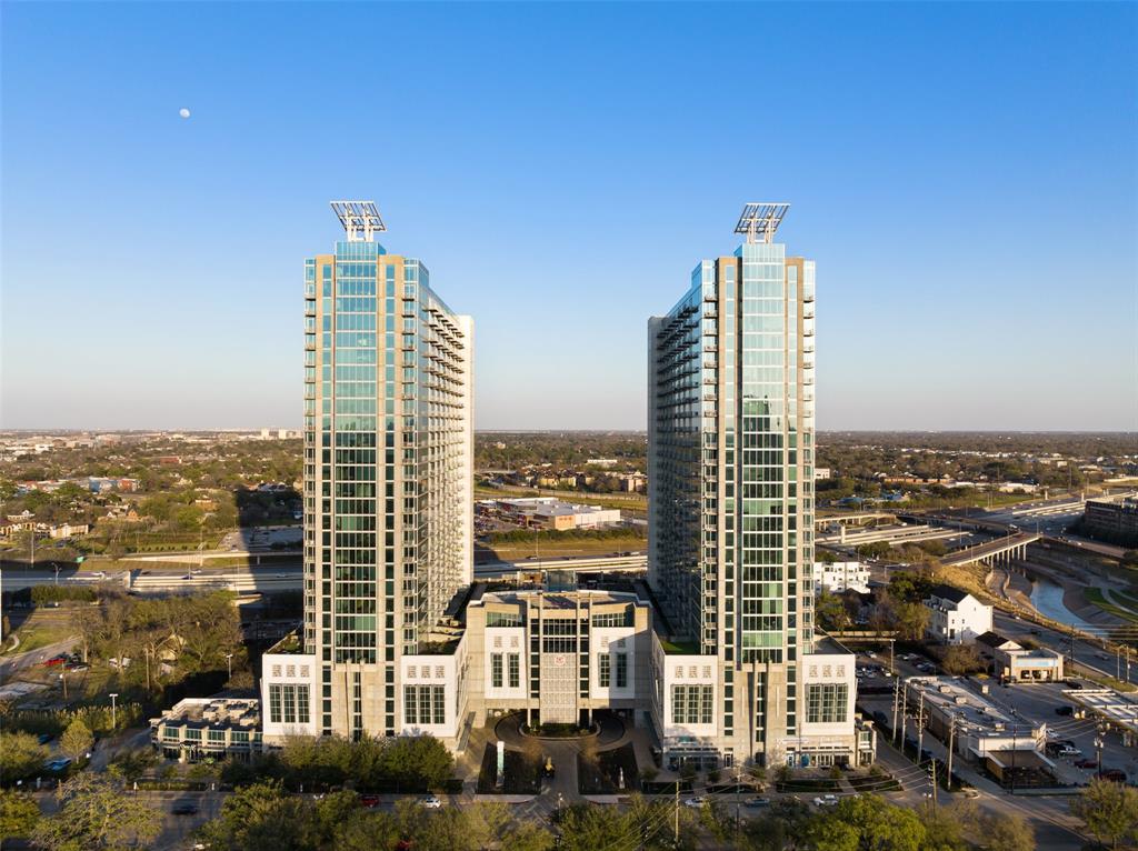 a view of a city with tall buildings