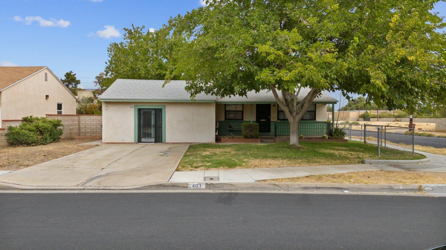 a house with trees in the background