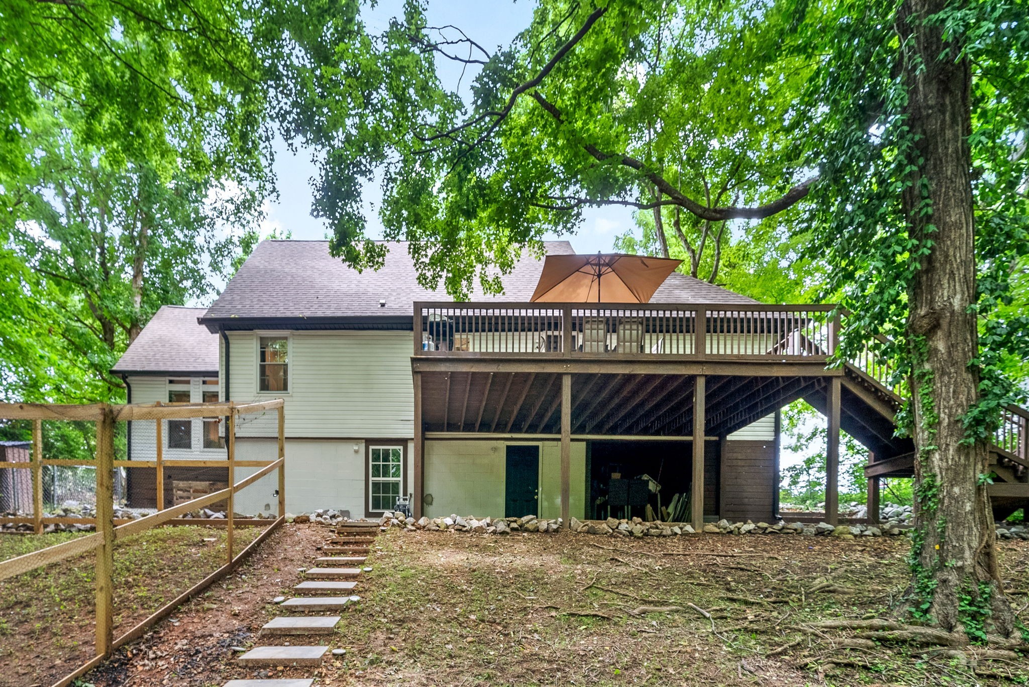 a front view of a house with yard