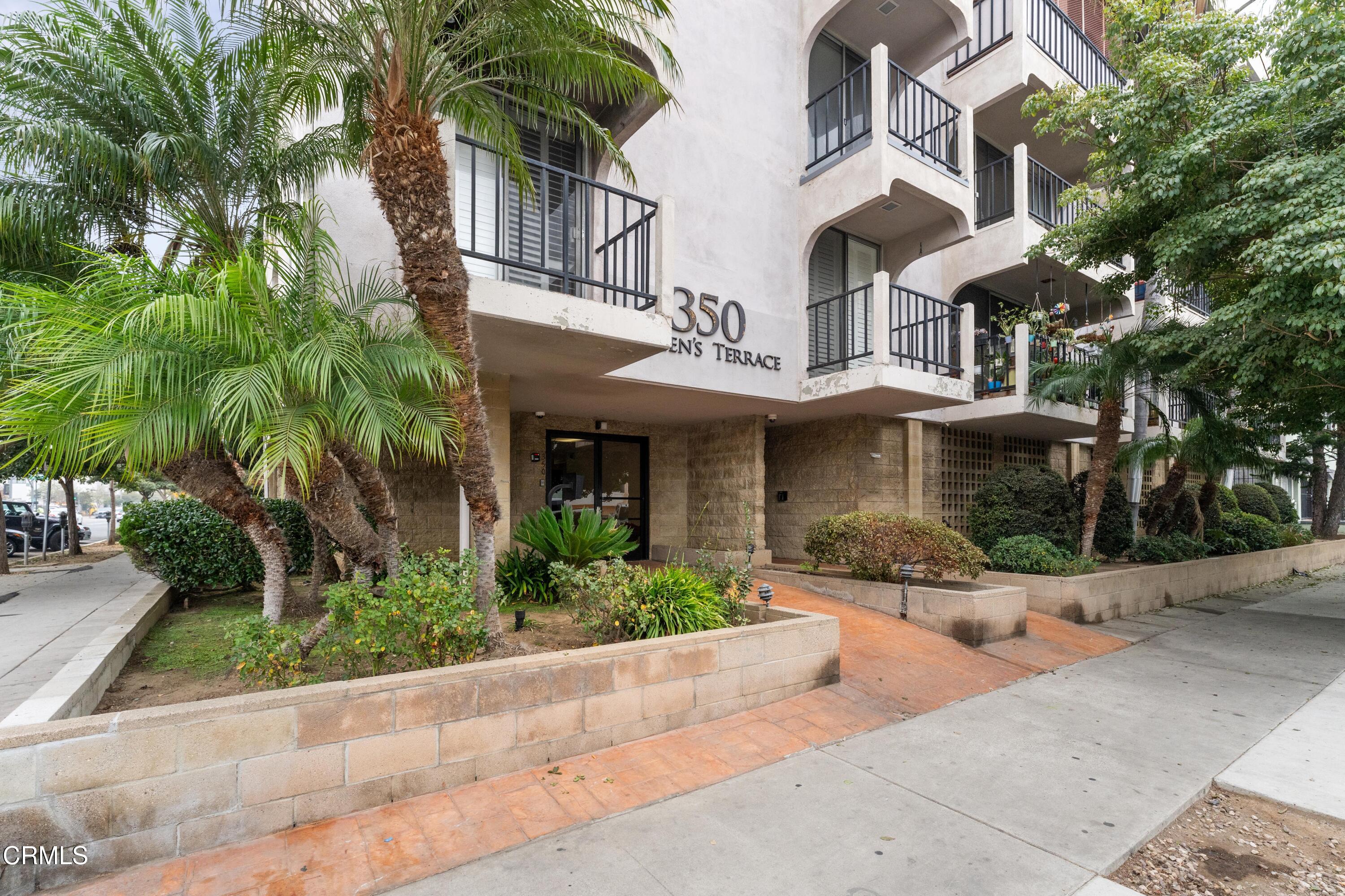 a front view of a multi story residential apartment buildings