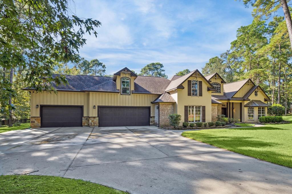 Stunning custom home in Lake Windcrest featuring 5/6 bedrooms, a study, game room, 3-car garage, and a pool on 1.79 acres with views of the 6th hole of Lake Windcrest Golf Course.