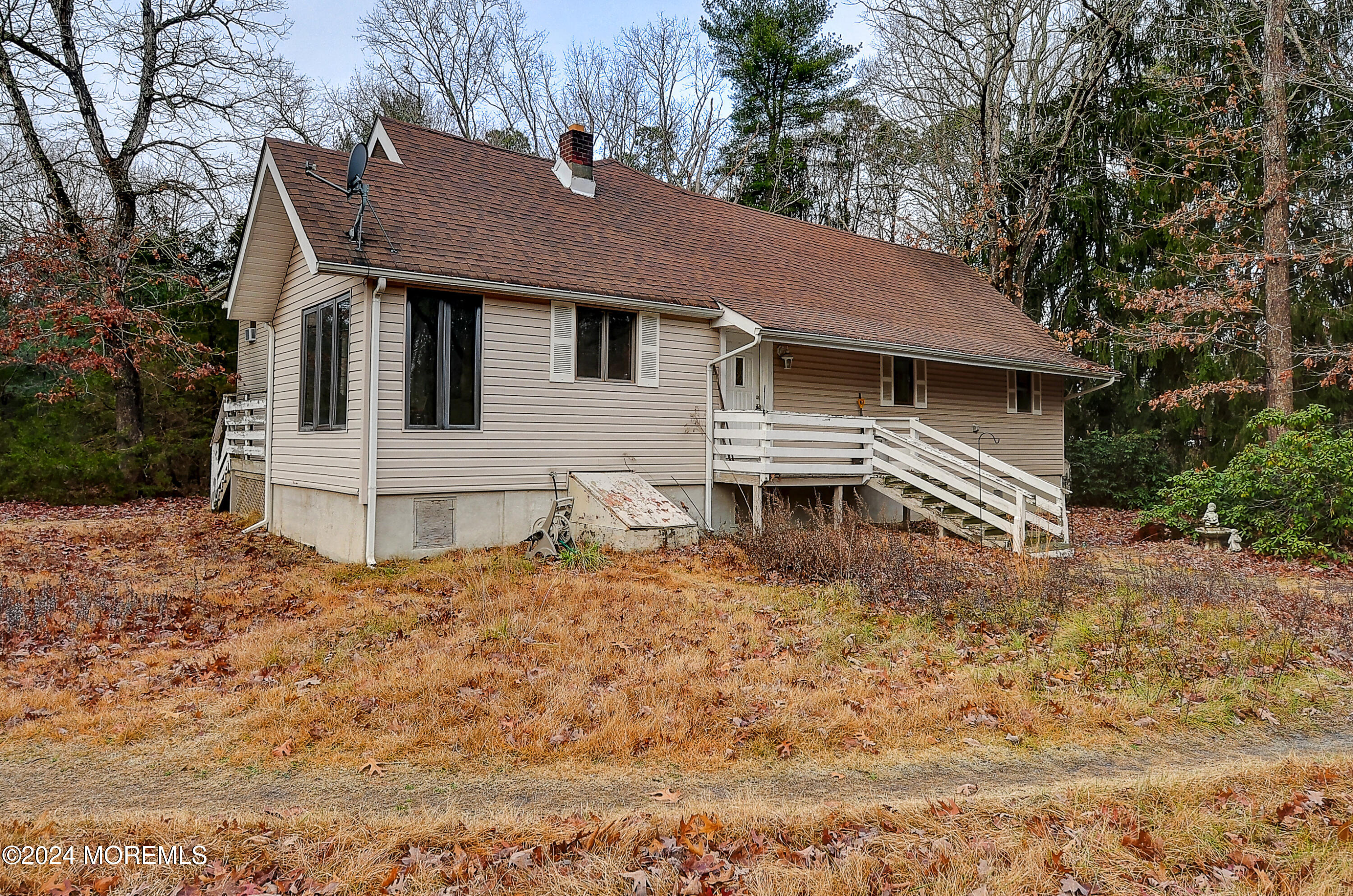 a house with trees in the background