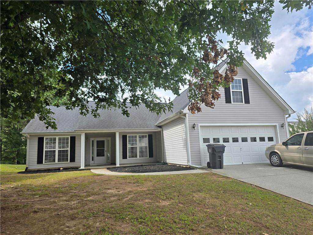 front view of a house with a yard