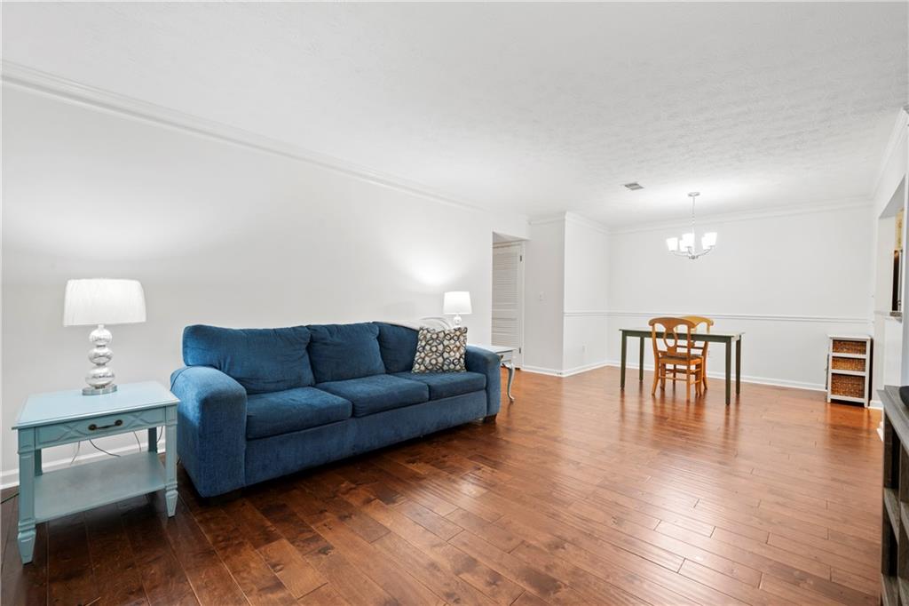 a living room with furniture and a table