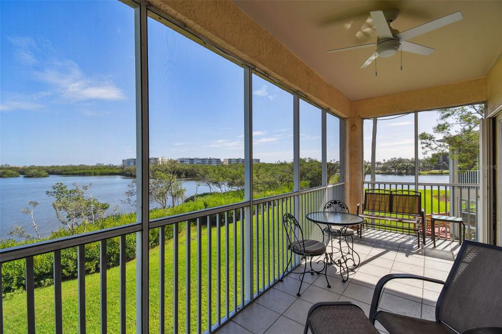 a view of a balcony with chairs