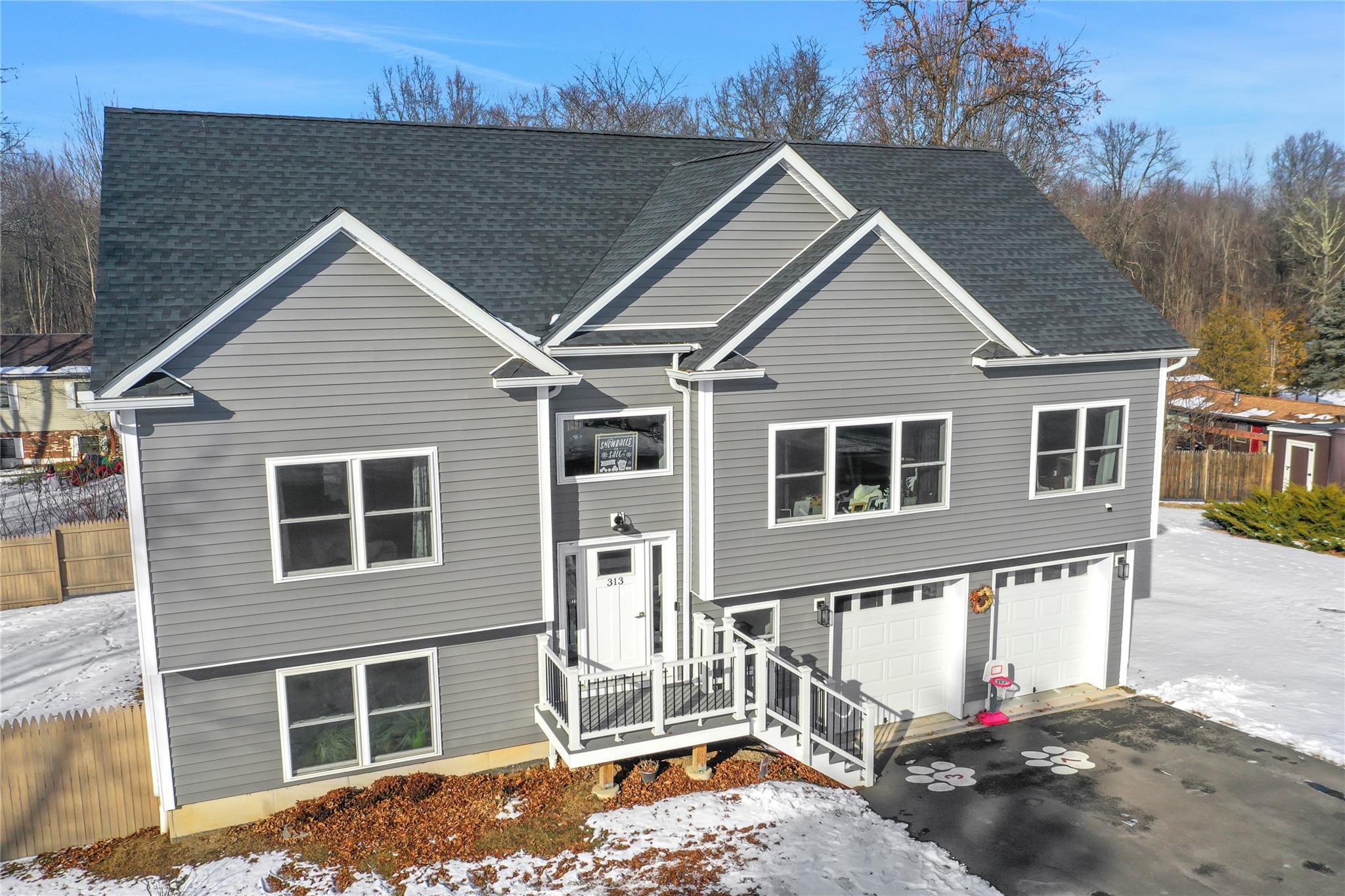 View of front of property with a garage